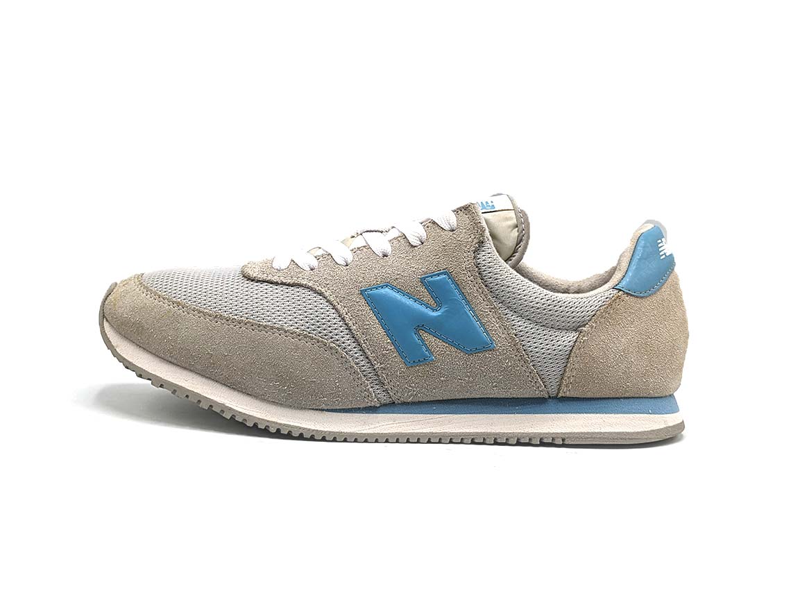New Balance Comp 100