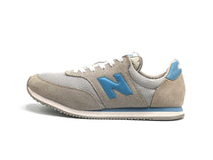 New Balance Comp 100