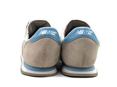 New Balance Comp 100